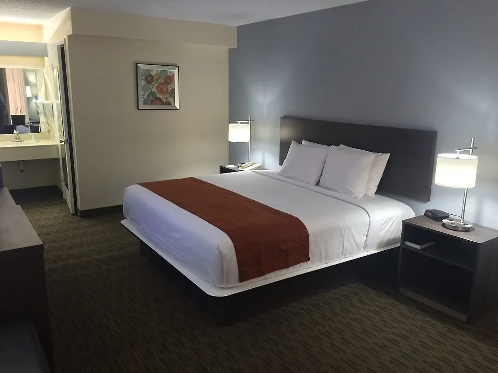 Days Inn & Suites By Wyndham Orlando Airport Motell